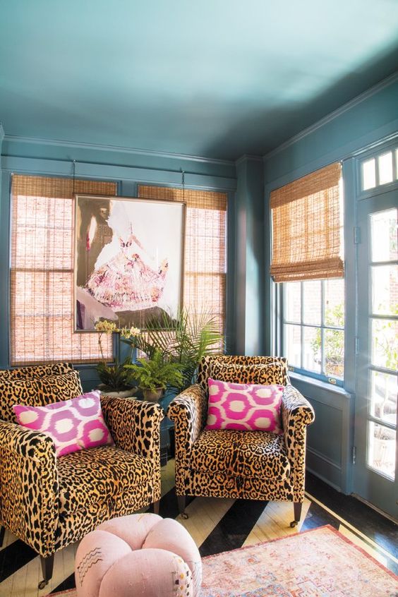 Cheetah print chairs make this pastel space more interesting