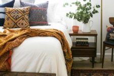 12 a comfy printed blanket and a neutral bed cover will make your guest feel comfy even if it’s cold