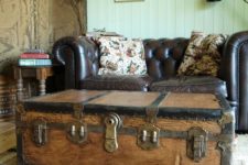 13 a vintage wooden trunk accentuates this living room and doubles as a coffee table and a storage