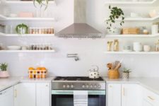15 a mint colored cooker makes a soft colorful statement in this neutral space