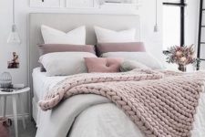 17 a chunky knit blanket matches the pillows and with a duvet provides enough warmth for cold ights