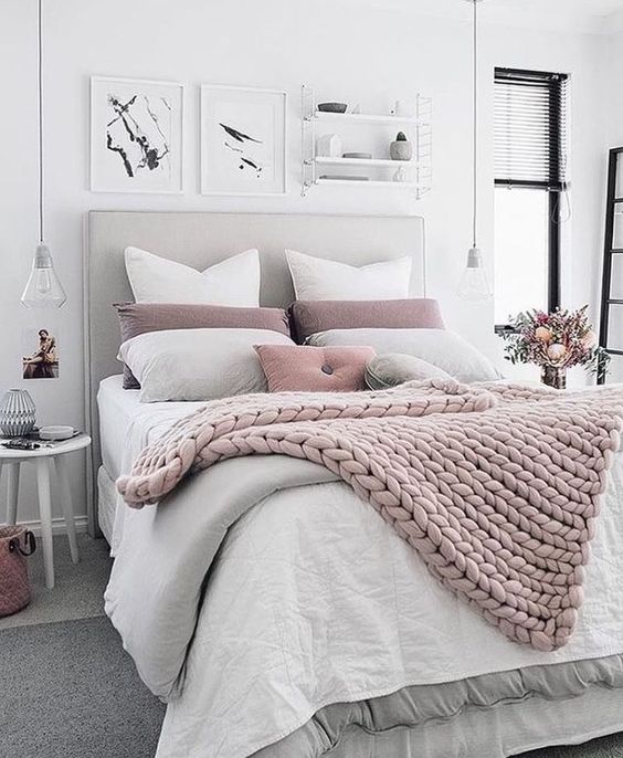 a chunky knit blanket matches the pillows and with a duvet provides enough warmth for cold ights