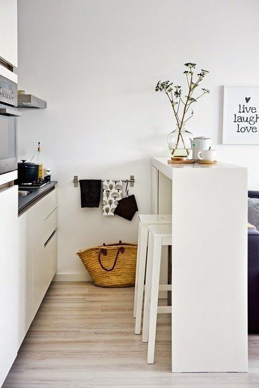 a sleek white countertop won't take much space and will look airy, which is great for small spaces