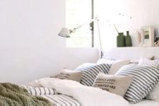 18 comfortable bedding of natural fabrics and an additional crochet blanket