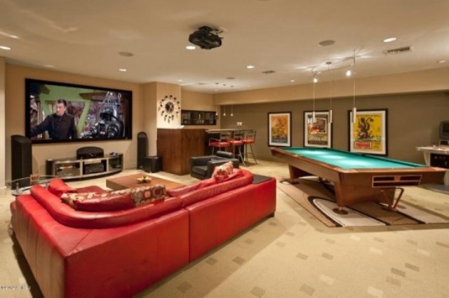 a TV watching space and a pool table are enough for a cool mnly party