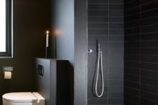 19 matte black shower tiles and matte grey and black surfaces for a moody masculine bathroom
