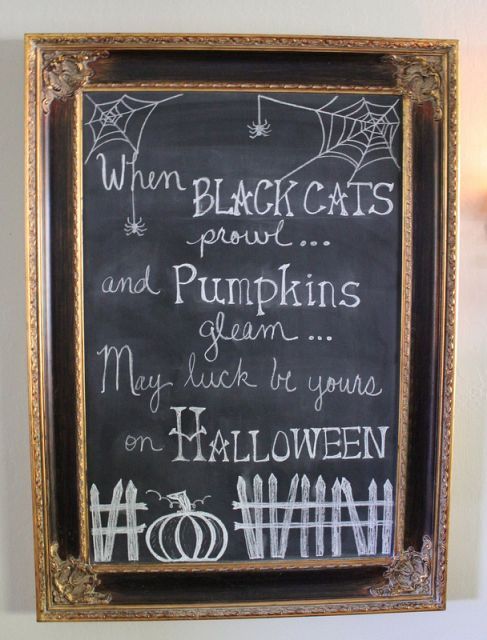 a chic chalkboard sign in a refined frame is cool for a refined feel