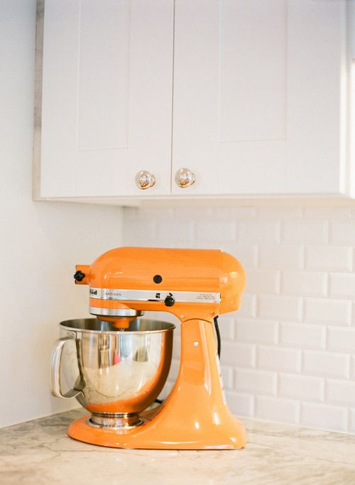 a kitchen aid mixer in bold orange to raise your mood while cooking