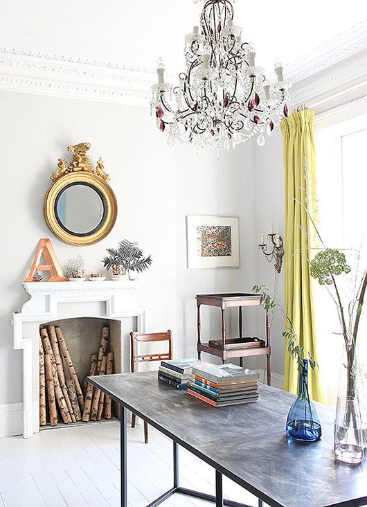 a neutral space with glam touches and lemon yellow curtains for a chic look