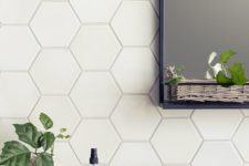 25 matte white tiles with white grout for a chic and timeless bathroom