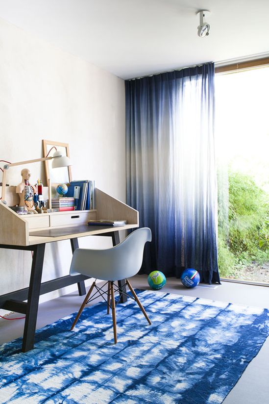 shibori curtains and a rug for a bold kid's room