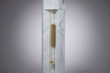 26 a luxurious version of a grandfather’s clock of white marble and brass