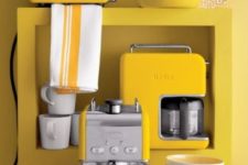 26 a set of sunny yellow kitchen appliances with a stainless steel touch for a sunny mood