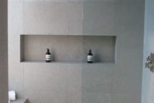 26 neutral matte grey large scale tiles inspired by concrete for a modern bathroom
