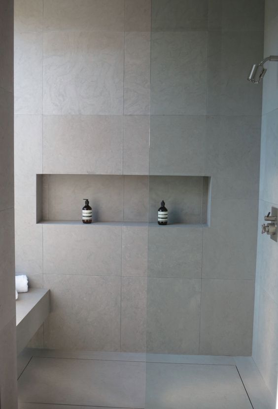 neutral matte grey large scale tiles inspired by concrete for a modern bathroom