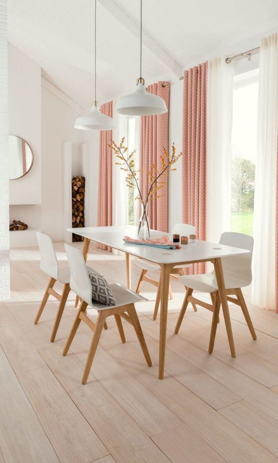 relaxing and soft dining room with textural pink curtains is made even cuter and softer