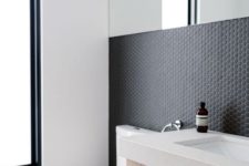 28 tiny matte black hex tiles to make a minimalist bathroom eye-catching
