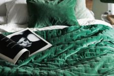 29 an emerald bedspread and pillow helps to follow the velvet trend and makes the bed inviting