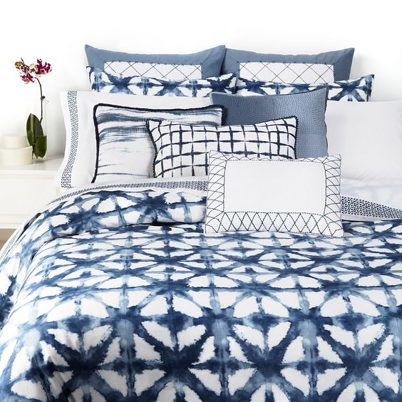 shibori pillows and a blanket DIYed for the bedroom will be a chic choice