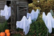 29 such funny ghosts of cheesecloth and coat hangers won’t scary anyone but will be proper decor