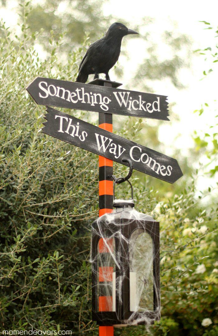 decorate any post in your backyard with a cool Halloween arrangment with several signs 