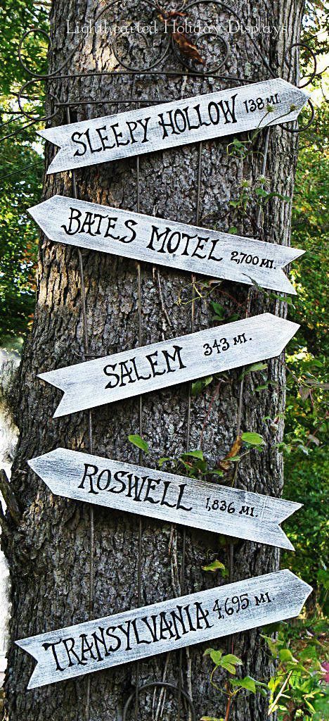 point out to spooky attractions with a sign hung up on a tree