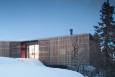 01 This chic summer cabin is located in a Norwegian ski resort, and it’s fully covered with pine louvres