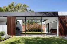 01 This house is organized into a series of brick volumes connected with bridges and gardens