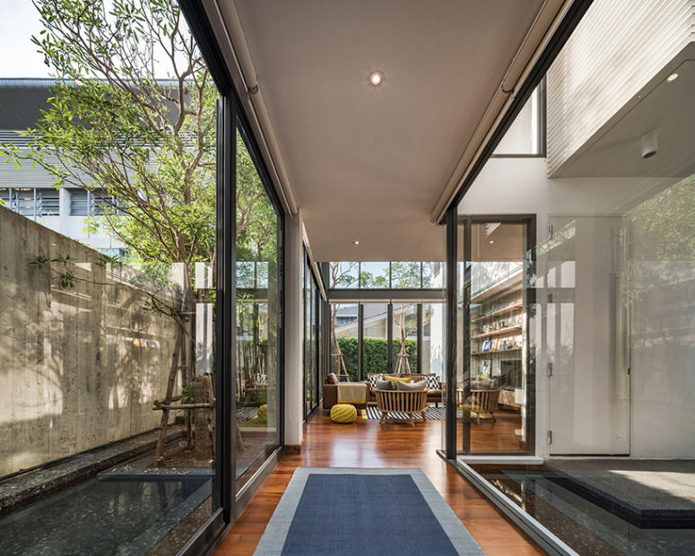 The enclosed spaces that provide privacy are created, while connecting the house to the urban ecology, and the inner courtyard brings much peacefulness inside