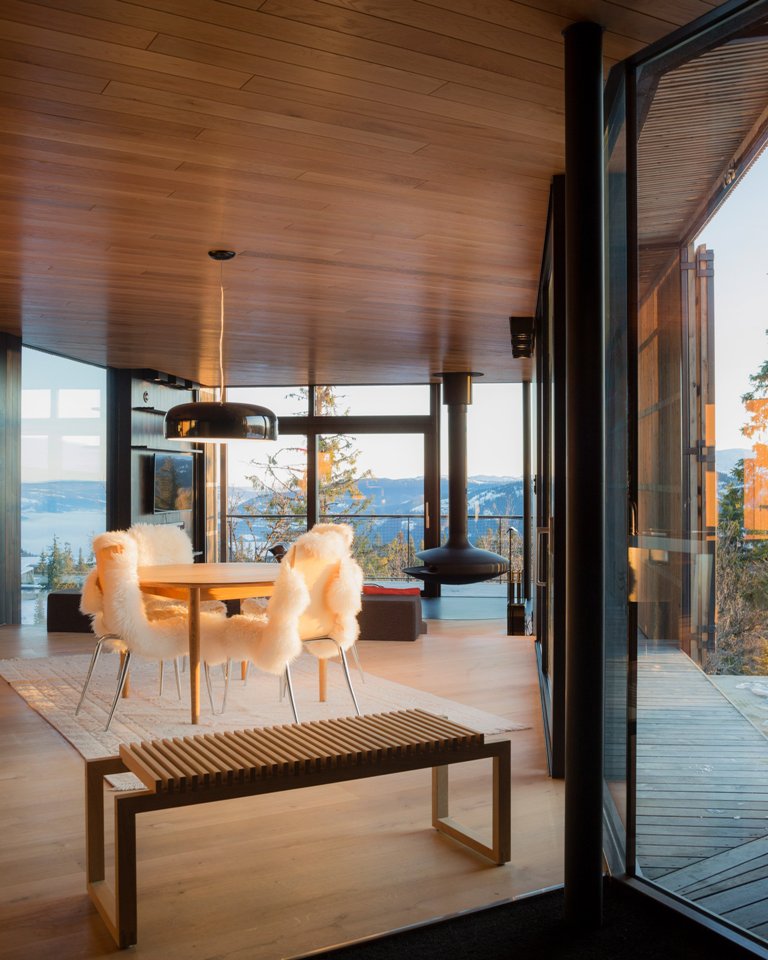 The inside is covered with oiled oak, and there's an open layout with adorable views
