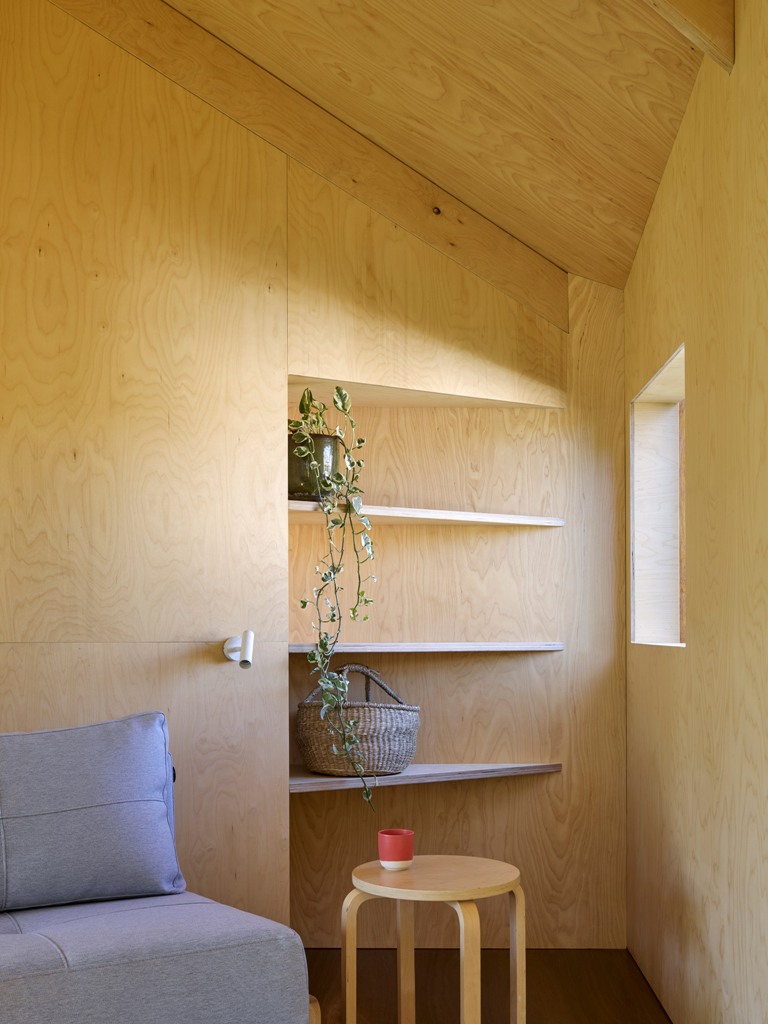 There's even a sitting nook here, where the owners can read and enjoy the calmness of the retreat
