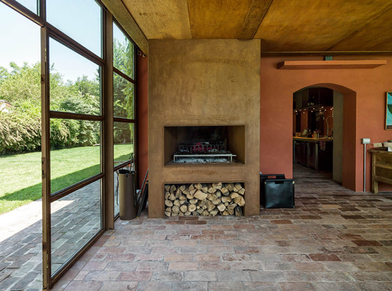 There's a real working fireplace with wood storage, which adds coziness and a homey feel
