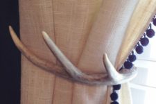 08 antler curtains holdbacks will effortlessly add a rustic feel to the space