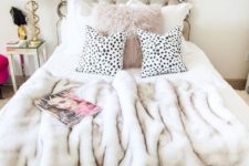 11 a faux fur pillow and bedspread is a nice idea not only to keep you comfy but also to add glam to your space
