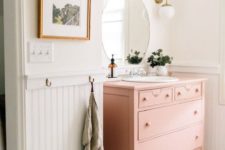 a pastel pink bathroom vanity will make your bathroom look completely different
