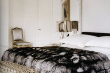 12 an elegant faux fur blanket adds a textural touch to your space