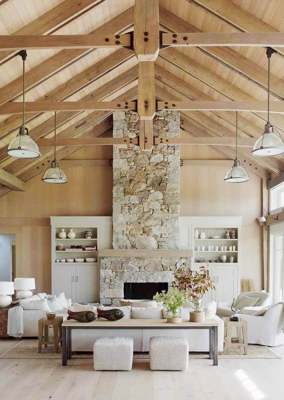 Chic wooden beams and wood covered ceiling is a gorgeous rustic feature that adds coziness