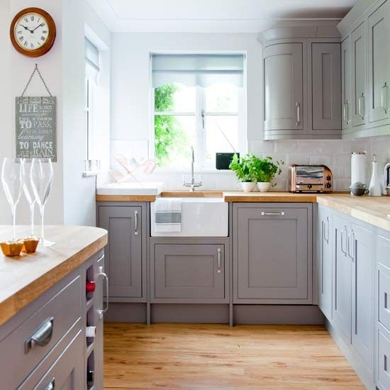 vintage farmhouse grey kitchen is refreshed with white details and nickel handles