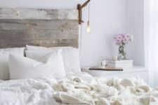 15 a reclaimed wooden headboard stands out in a neutral space and can be easily DIYed