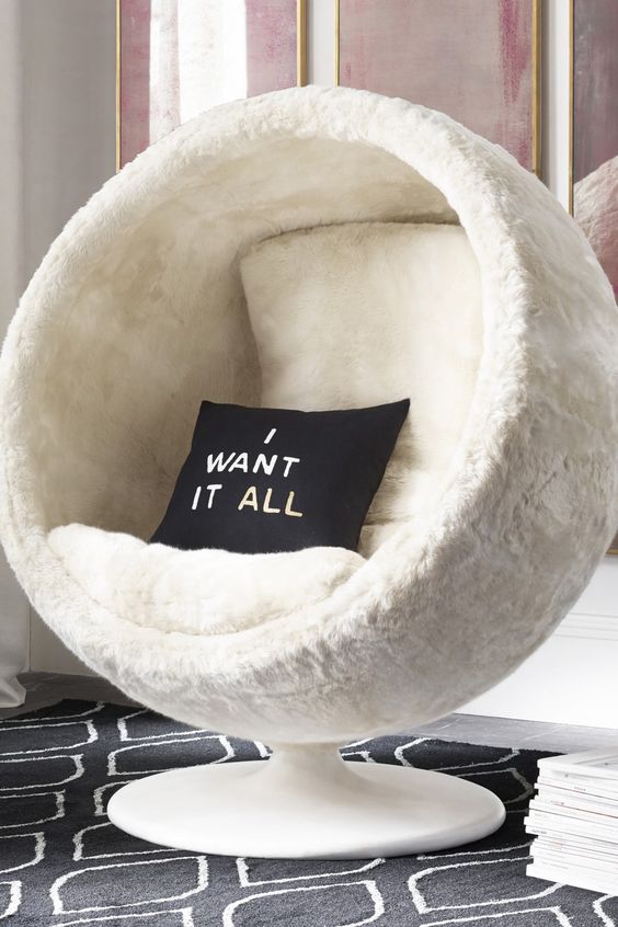 orbit faux fur chair with cushions looks incredibly comfortable and inviting