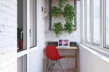 17 an industrial home office with a small desk, a tile floor and whitewashed brick walls