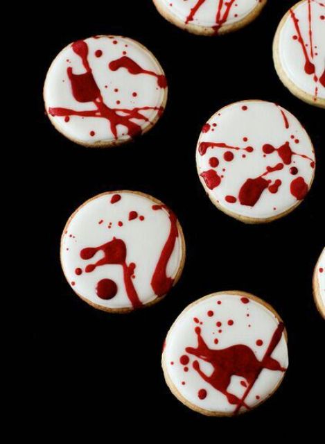 blood splatter cookies are ideal for a dessert table at a vamprire Halloween party