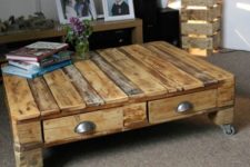 19 a reclaimed pallet wood low coffee table on casters with drawers can be easily DIYed