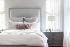 20 a chic grey bedroom is enlivened with a faux fur dusty pink bench and a matching pillow