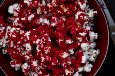 20 bloody popcorn is an easy and delicious treat for your Halloween party