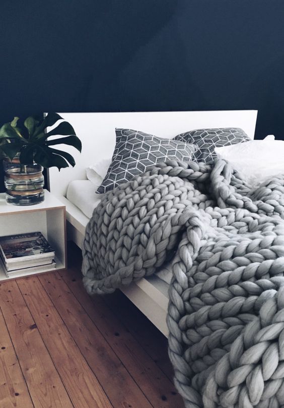 chunky knits are a perfect hygge accessory, they can fit any kind of bedroom