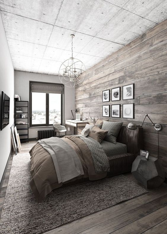 a bedroom with a wall and floor of reclaimed wood to feel cozier here