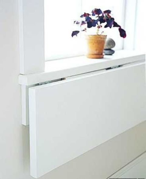 a folding windowsill can be used as a desk or a dining space