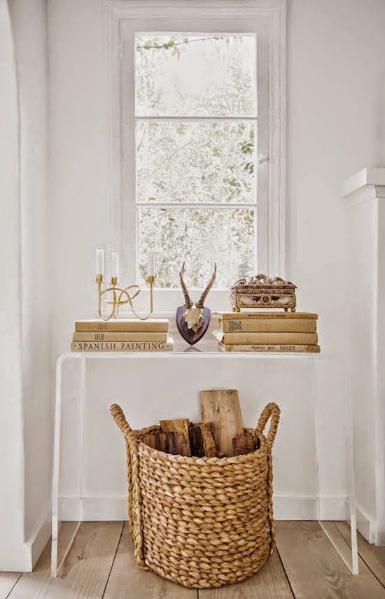 a wicker basket with firewood is a nice way to add a cool rustic feel to the space