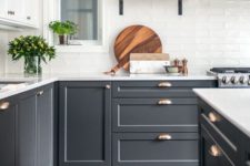25 graphite grey cabinets are made more elegant with metallic handles and white tabletops